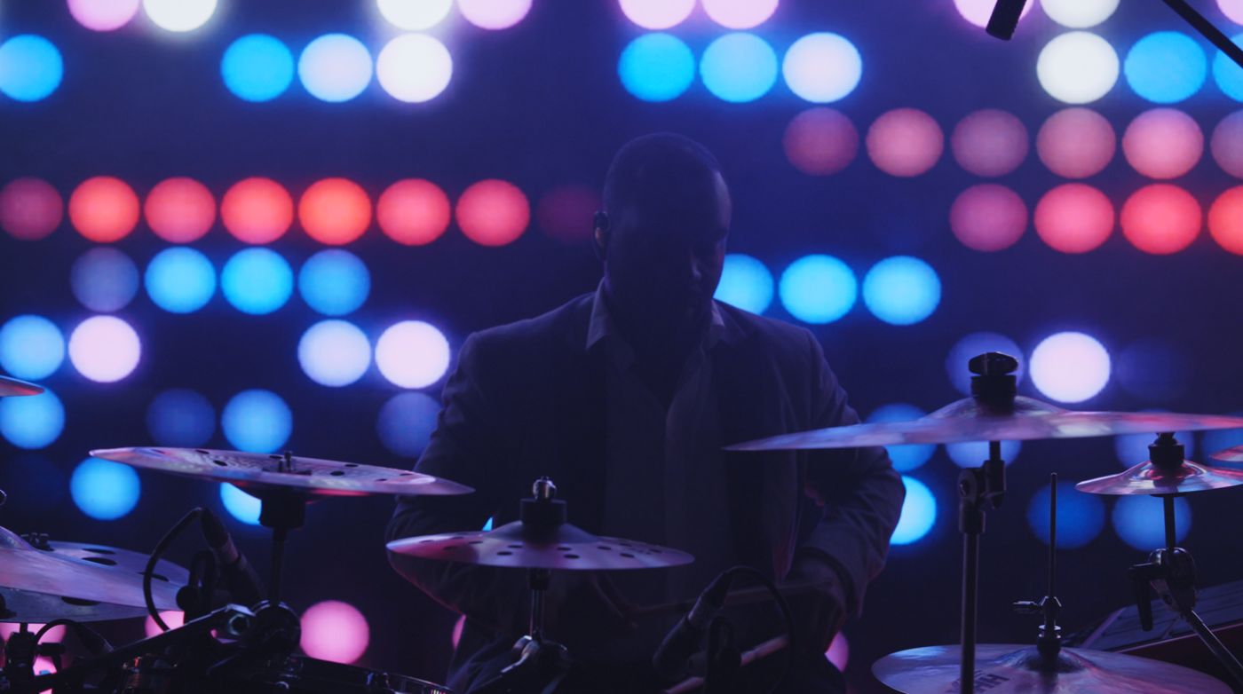 The drummer under the lights